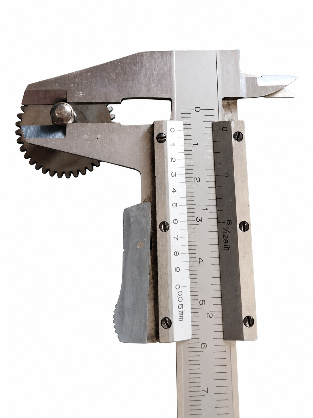 Serie ingranaggi per motorino elettrico, variante con perno da 0,6 cm (6 mm), fotografata con calibro su fondo bianco